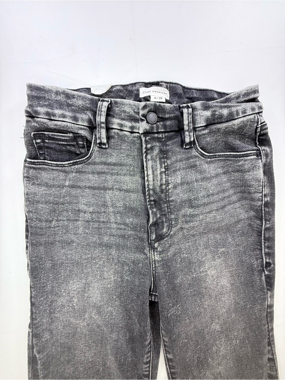 Good American Washed Black Flare Jeans with Split Hem